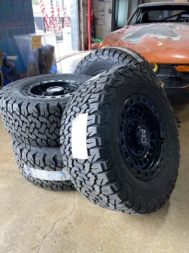 Large off-road tires mounted on wheels