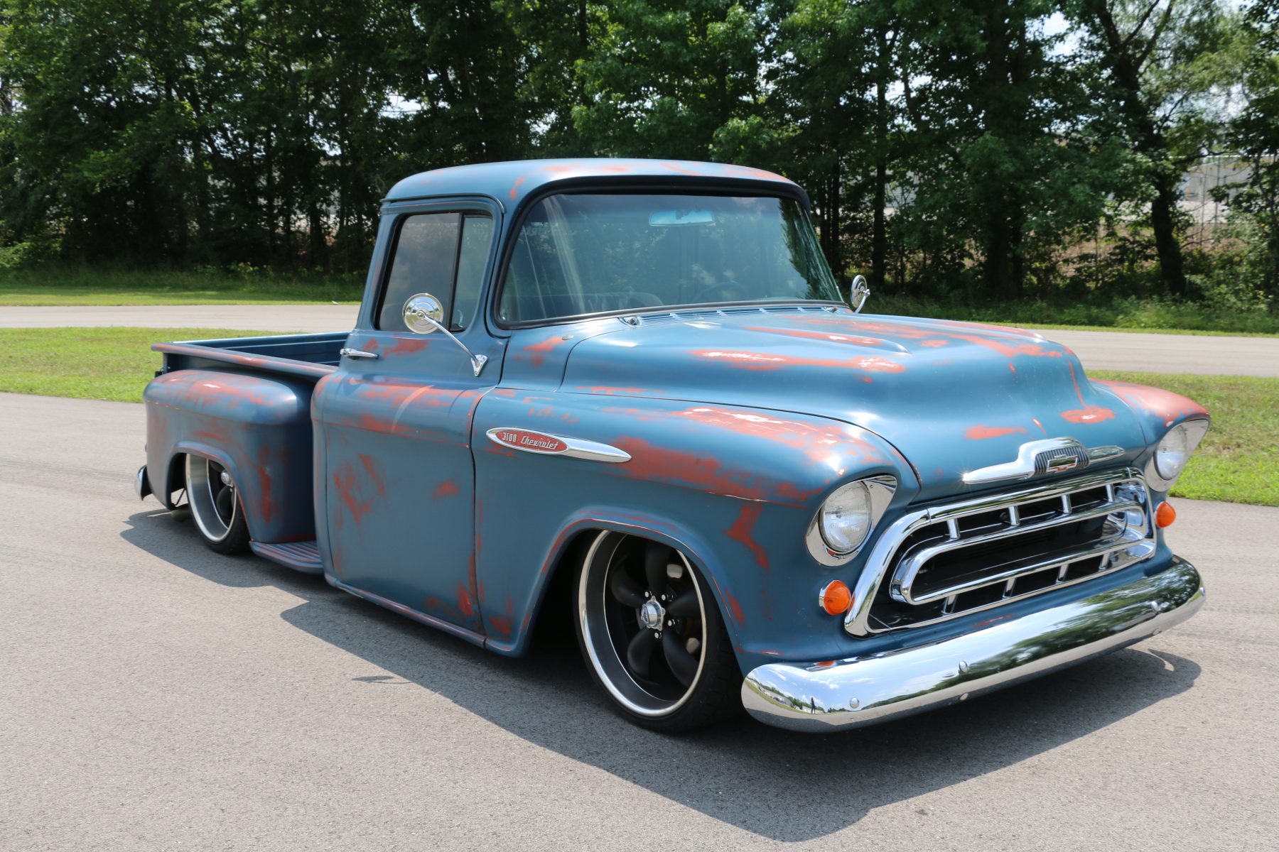 Lowered truck with aftermarket wheels