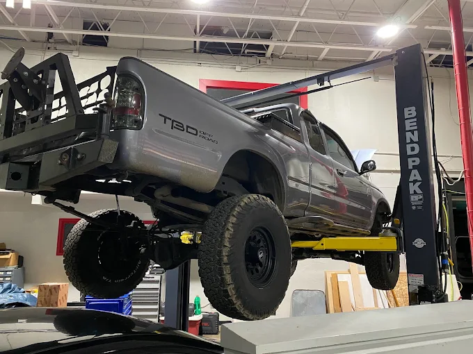 Lifted Tacoma on BendPak lift