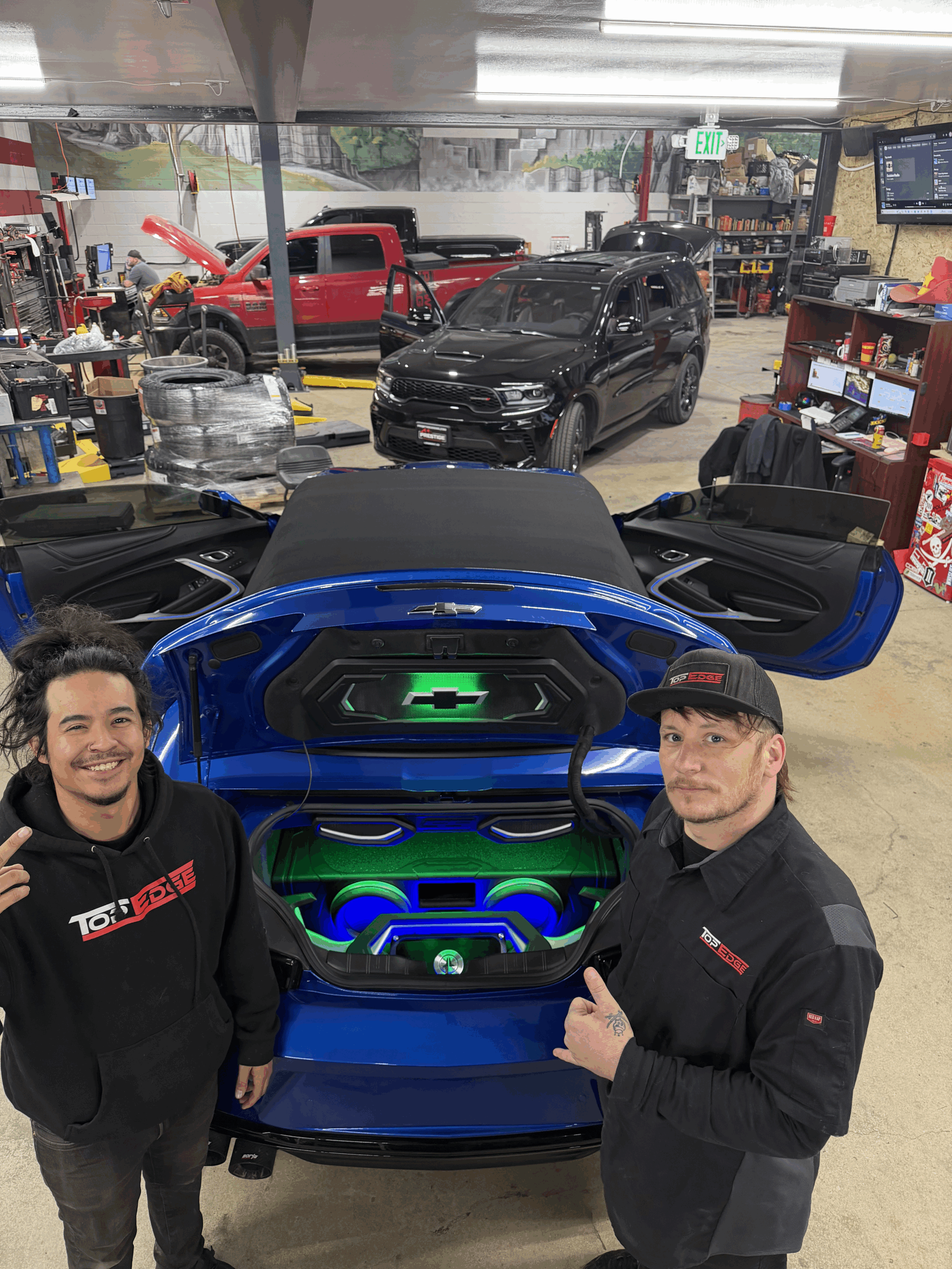 Custom car audio builds with technicians trunk build fabrication DSP tuning