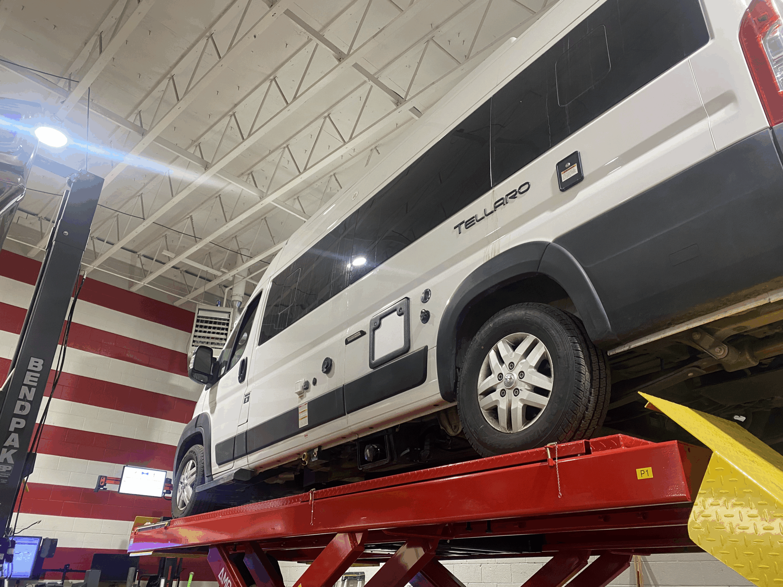 Camper van on lift service